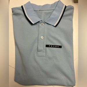 Prada mens short sleeve polo in blue slim fit runs small fits a size Medium